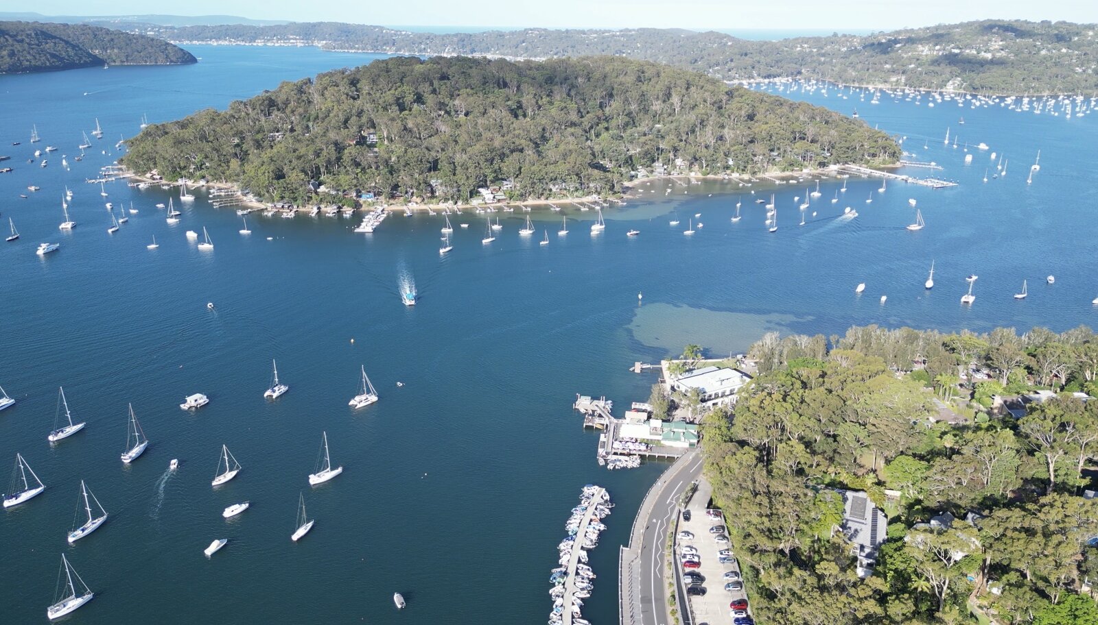 Aerial view of Church Point and Scotland Island, with yachts on Pittwater